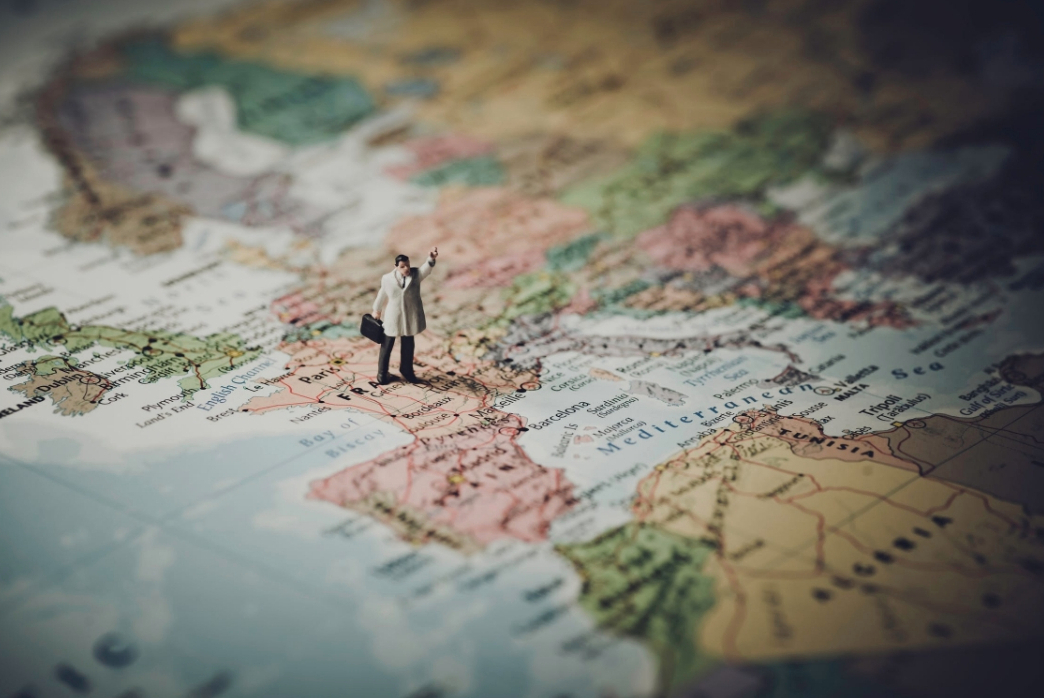 Man stands on a global map