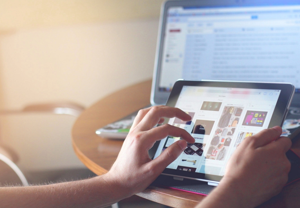 Person shopping online on an iPad
